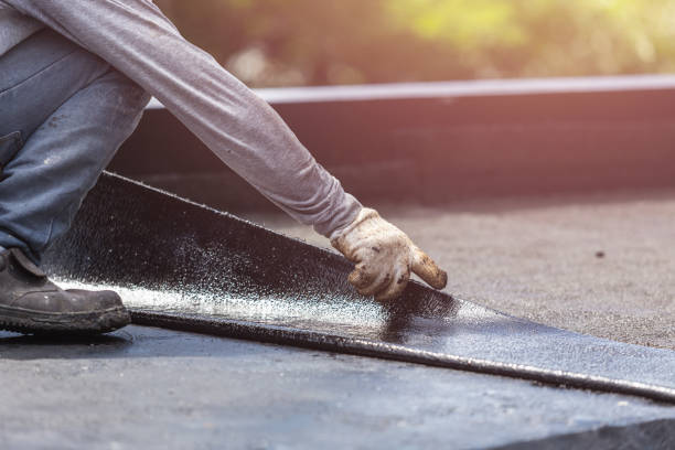 Professional Interior Drainage System technician working in Devon, PA